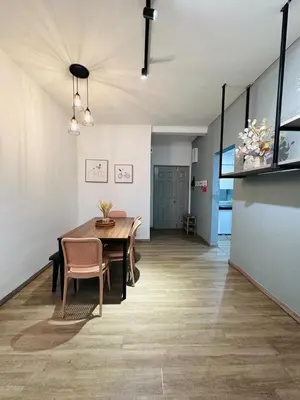 a dining room with a table and chairs at Adamhawa Homestay Emerald Avenue Brinchang in Brinchang