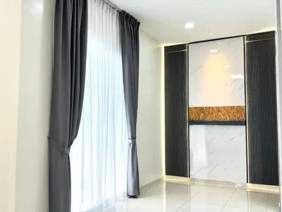 a large window with black curtains in a room at Sekinchan 2008 Homestay Karaoke BBQ in Sekincan