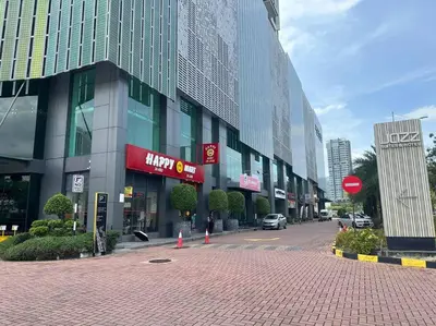 a large building with a street in front of it at JazzA 2R3B Suite Strait Quay Near Stonyhurst School by Homey Planet in Tanjong Tokong