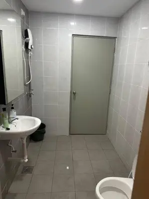a bathroom with a toilet and a sink at Ulike~Homestay~C~3Room-The Venus in Sitiawan