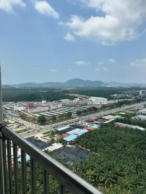 a view of a city from a balcony at Ulike~Homestay~C~3Room-The Venus in Sitiawan