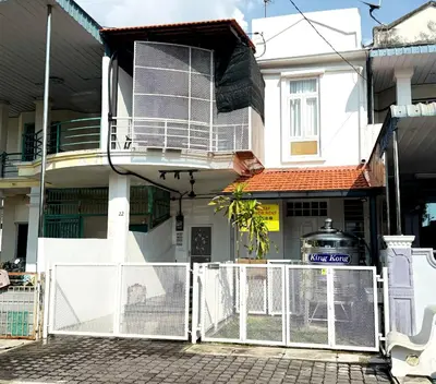 a white gate in front of a house at Nibong Tebal Studio Home Stay in Nibung Tebal