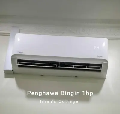 a printer sitting on top of a counter at Iman Cottage Homestay Hospital Kulim Hitech in Kulim
