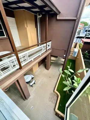an overhead view of a balcony with two benches at YK Sweet home sungai petani 1 @ 16 people above in Sungai Petani