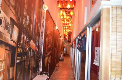 a hallway of a store with a long hallwayngth at Dou Houz Georgetown in George Town