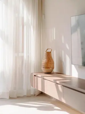 a vase sitting on a table next to a window at Mint Villa with Jacuzzi Pool in George Town