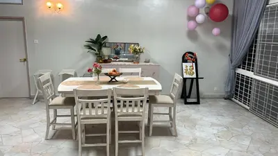 a dining room with a table and chairs at The Hidden 7 in Taiping