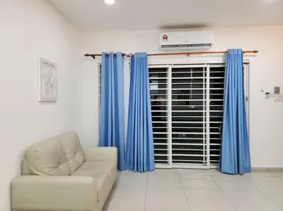 a living room with a couch and blue curtains at IPOH BOTANI bauhaus 17pax/4BR/mahjong/tv box in Ipoh