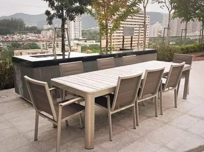 a white table and chairs sitting on a balcony at Romantic Sea View @ Urban Suite in Jelutong