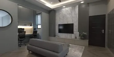 a living room with a couch and a flat screen tv at coolvibes homes in Cameron Highlands