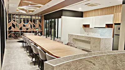 a conference room with a long table and chairs at Apartment in Georgetown 3BR-10pax in Jelutong