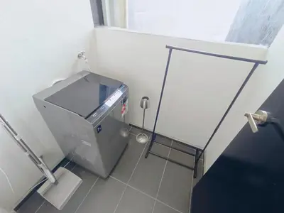 a small bathroom with a toilet and a window at Infinity Pool, Georgetown, Up to 11 Pax, 3 Bedrooms, 2 Bathrooms, 2 Car Parks by Star Home in Jelutong
