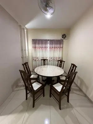 a dining room with a table and chairs and a window at DOUBLE EE HOMESTAY 6 cars parking place 12pax in Sitiawan