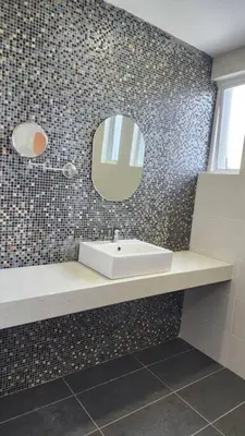 a bathroom with a sink and a mirror at Zinnia Residence in Tanah Rata