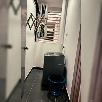 a hallway with a trash can in a room at Prima Falim in Ipoh