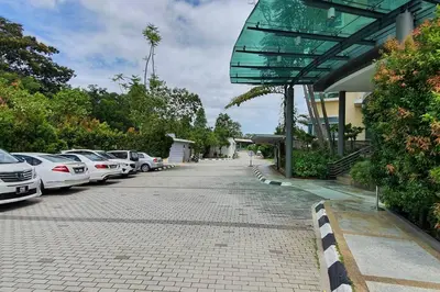a row of cars parked in a parking lot at Sky Residence -3 Bedrooms Condo at Cinta Sayang, Sungai Petani in Sungai Petani