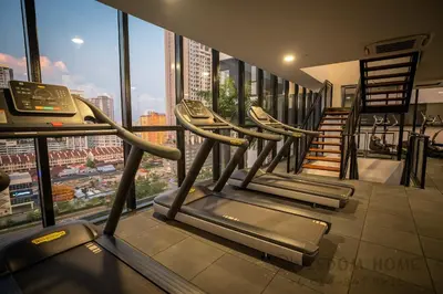 a gym with a view of a city at Seaview Urban suites Georgetown @Penang in Jelutong