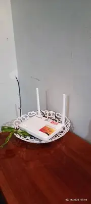 a cake sitting on top of a wooden table at Casa Margosa Homestay in Ipoh