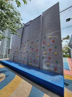 a retaining wall with a climbing wall at Urban Muji Retreat Suites #3BR #2carparks in Jelutong