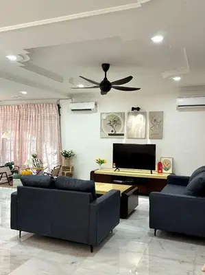a living room with two couches and a piano at Cozy 2StoreyHome 5Room11Pax@ChaiLengPark in Perai