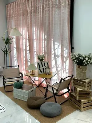 a living room with two chairs and a table and a window at Cozy 2StoreyHome 5Room11Pax@ChaiLengPark in Perai
