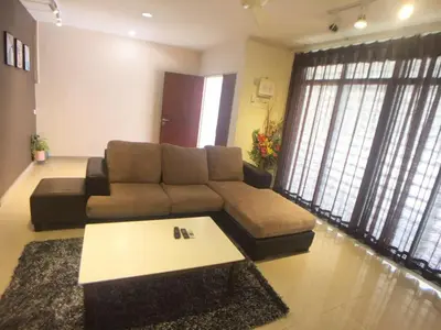 a living room with a couch and a coffee table at 38 Georgetown 3 Storey Terrace local food 5rooms 16pax in George Town