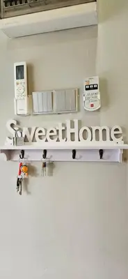 a shelf with microwaves and appliances on a wall at TELUK INTAN LANDED LUXURY HOMESTAY 3BEDROOM in Teluk Intan