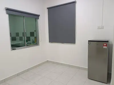 a white room with a refrigerator and a window at 8Pax comfortable setia residen in Sitiawan