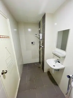 a bathroom with a sink and a mirror at Ipoh Anderson Suites by Migliore in Ipoh