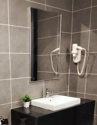 a bathroom with a sink and a mirror at Lost World of Tambun, Sunway Onsen Studio, 1BR, 2-4pax in Tambun