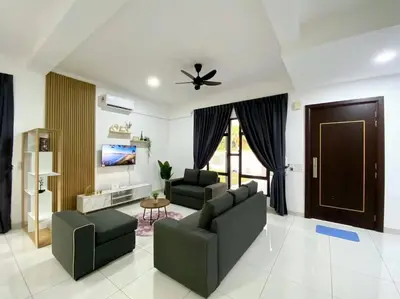 a living room with two couches and a ceiling fan at BrandNew Modern Cozy House@ALMA NEAR JUSCO in Bukit Mertajam