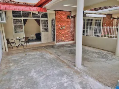 an empty room with a brick wall and a patio at Queensbay Mall, Up to 5 Pax, 2 Bedrooms, 1 Bathroom, 1 Car Park by Star Home in Bayan Lepas