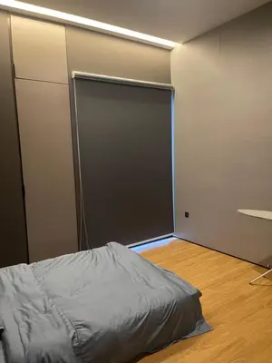 a room with a sliding door with a bed in it at Luxury Seaview Private Elevator Near Island Hospital and Gurney plaza \u68b9\u57ce\u65e0\u654c\u6d77\u666f\u79c1\u4eba\u7535\u68af\u9760\u8fd1\u533b\u9662\u548c\u5546\u573a in Tanjong Tokong
