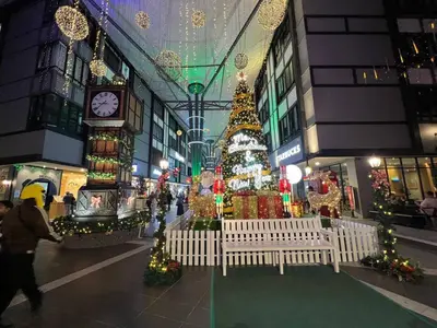 a shopping mall with a christmas tree and christmas decorations at Aufa Homestay 2 at Emerald Avenue Brinchang in Brinchang