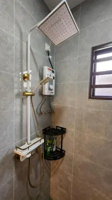 a shower in a bathroom with a shower at AY Homestay Midtown Falim in Ipoh