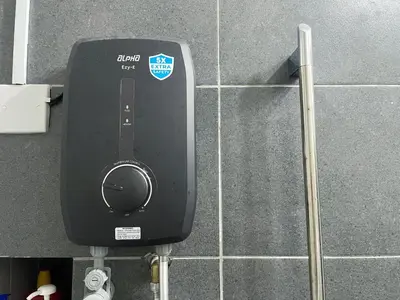 a black speaker is attached to a tile wall at 2 Carpark 3R2B 10 Pax City View Condominium 23A in Jelutong