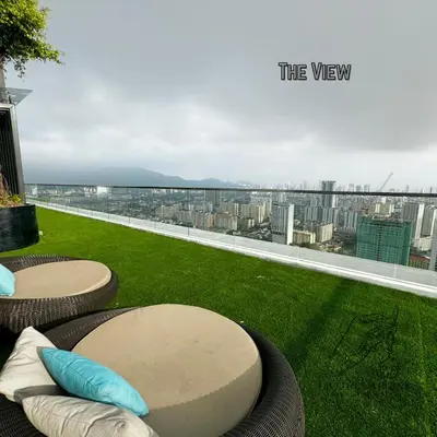 a balcony with a view of a city at Urban Suites Studio #SelfCheck-In #PrivateSpace in Jelutong