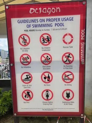 a sign for the dangers of swimmingpool at The Octagon Ipoh City Centre Leisure Suite in Ipoh