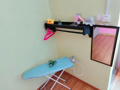 a dressing table and mirror in a doll house at Idea Homestay 1 in Chemor