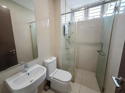 a bathroom with a toilet and a shower and a sink at 162 Home4Stay Deluxe Big 3story 6Rooms 20pax Wedding USM Arena Bridge in Gelugor