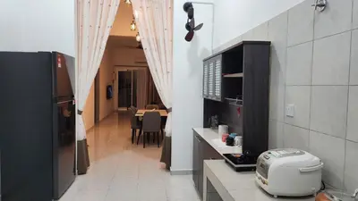 a kitchen with a counter with a toaster on a counter sidx sidx at Masturi Homestay in Chemor