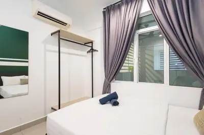 a bedroom with a white bed and a window at Dream - Summer @Majestic Condo in Ipoh