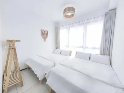 a white room with two beds and a ladder at 3410 Home4Stay TownArea NewCozyHome InfinityPool in Jelutong
