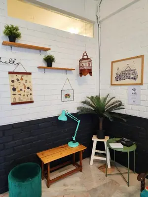 a room with a desk and a lamp on a table at Ipoh Station 18, Aeon Ipoh Rainforest 2 rooms LOFT 2 Homestay in Ipoh