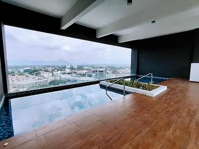 a room with a balcony with a view of a city at Yuru House - The Horizon Ipoh in Ipoh