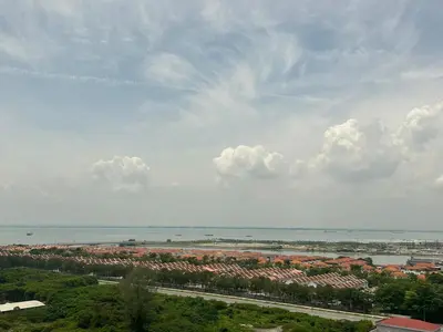 a view of a city and the water with buildings at 2BR, 1 Car Park, 4Pax Seaview 118IslandPlaza in Tanjong Tokong