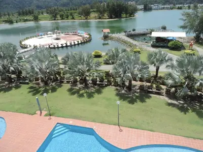 an aerial view of a resort with a swimming pool at Marina Island Seaview Homestay in Lumut