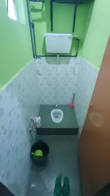 a small bathroom with a toilet in a room at Penang Green Homestay 1st Floor in Permatang Pauh
