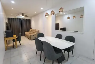 a living room with a table and chairs and a couch at Meritus Premium Home Suite 8 Pax in Perai