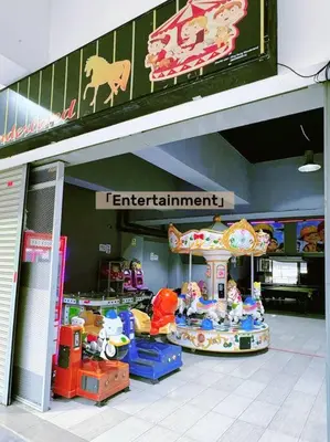 a store with a carousel and a sign in a store at Tea Valley & Farm View at Cool Summer Cameron in Cameron Highlands